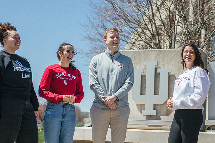 McKinney School of Law students stand outside Inlow Hall.